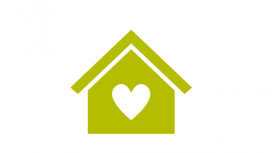 a green house on a white background with a white heart on the front